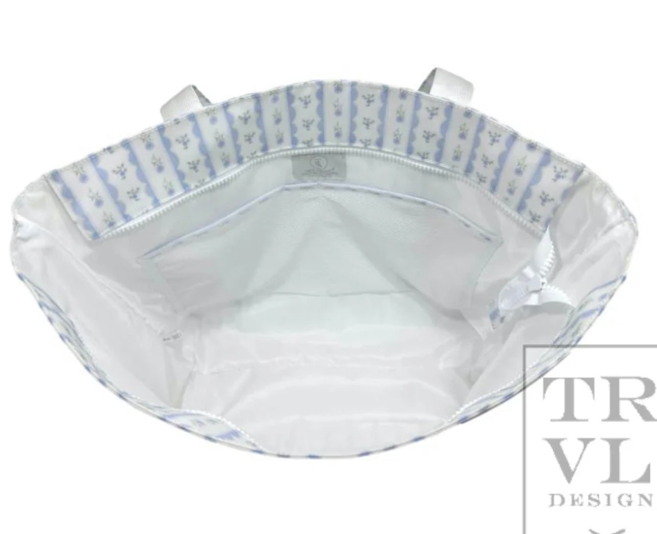 TRVL XL JUMBO TOTE with luggage slide on suitcase