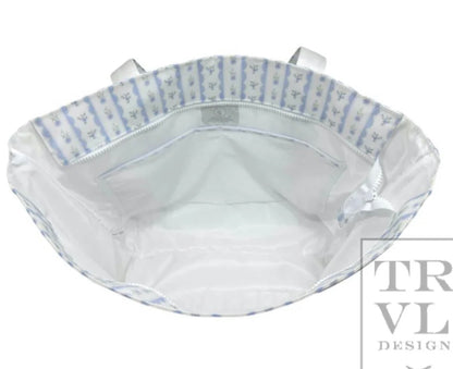 TRVL XL JUMBO TOTE with luggage slide on suitcase