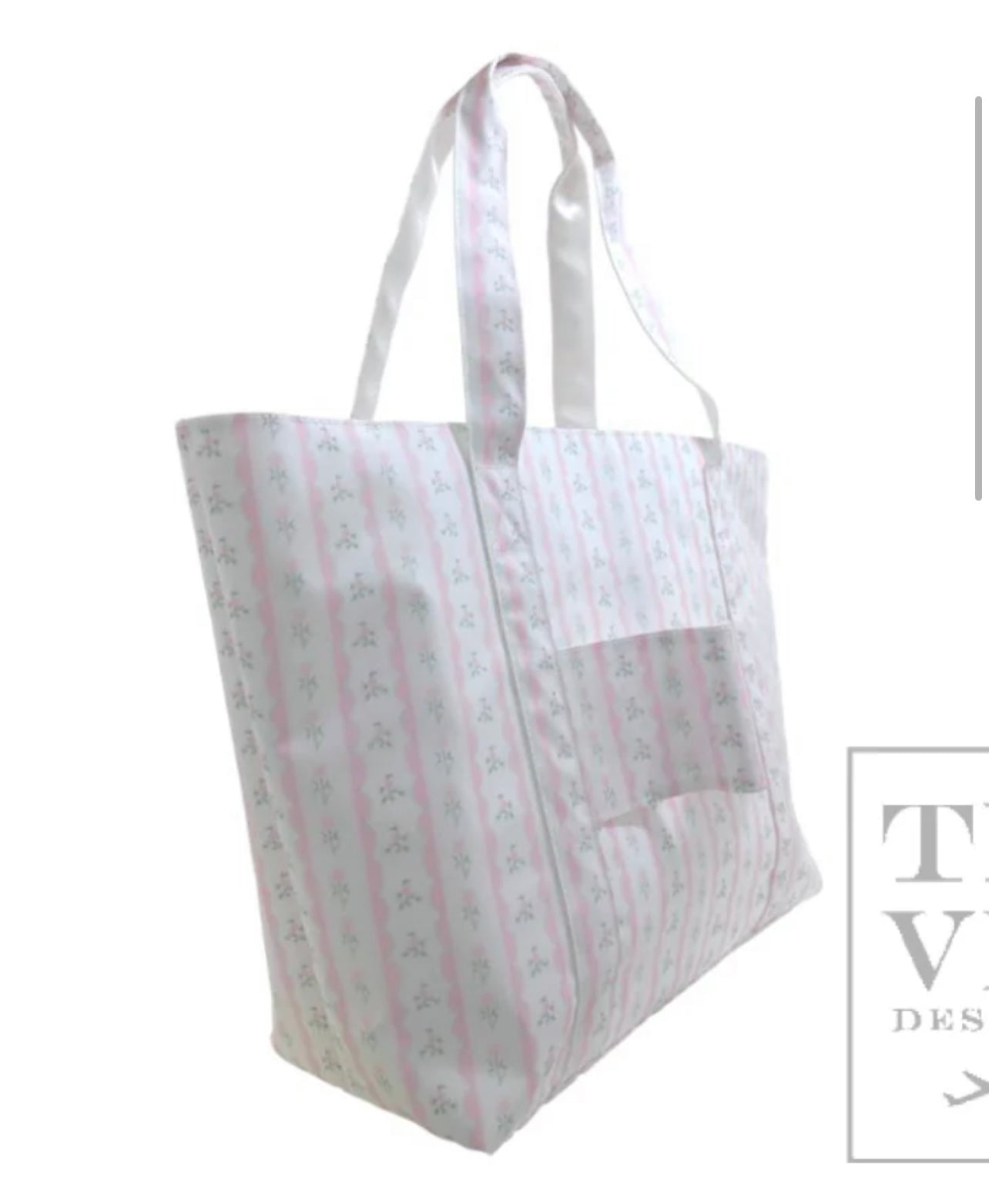 TRVL XL JUMBO TOTE with luggage slide on suitcase