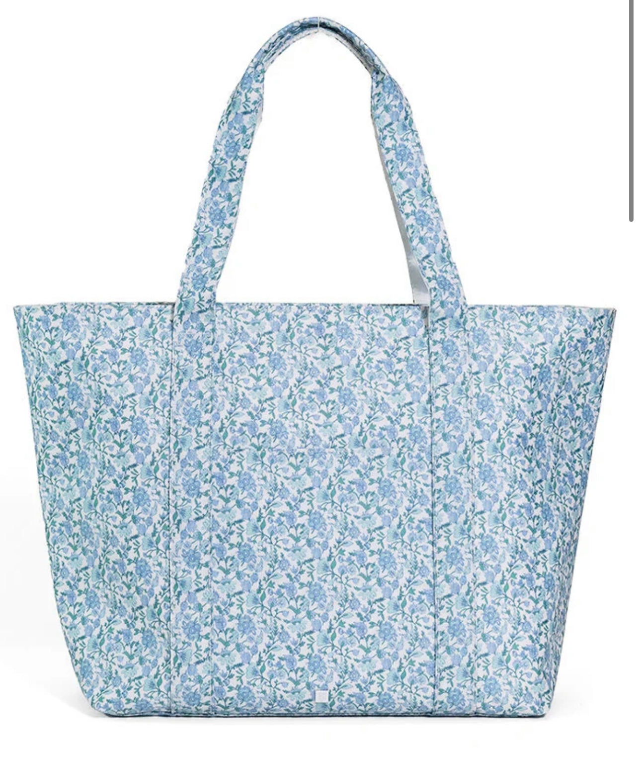 TRVL XL JUMBO TOTE with luggage slide on suitcase