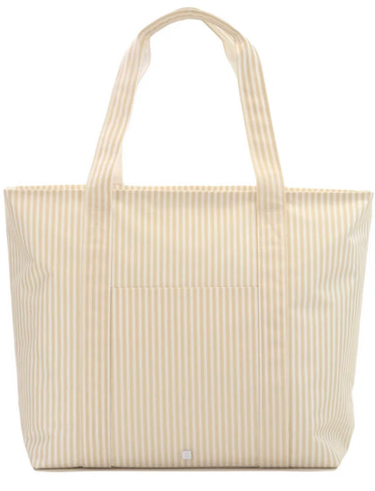 TRVL XL JUMBO TOTE with luggage slide on suitcase