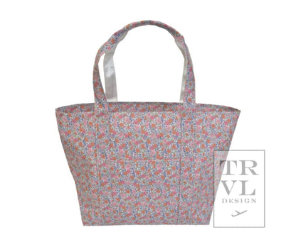 TRVL XL JUMBO TOTE with luggage slide on suitcase