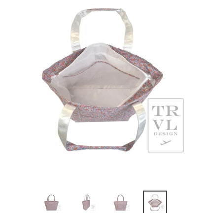 TRVL XL JUMBO TOTE with luggage slide on suitcase