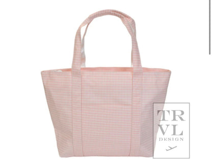 TRVL XL JUMBO TOTE with luggage slide on suitcase