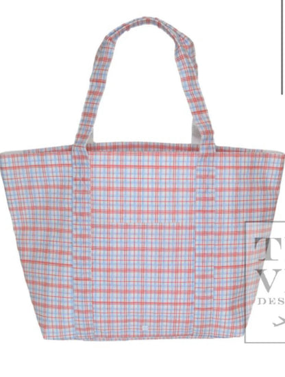 TRVL XL JUMBO TOTE with luggage slide on suitcase