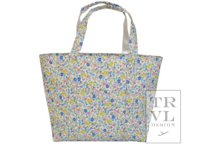 TRVL XL JUMBO TOTE with luggage slide on suitcase